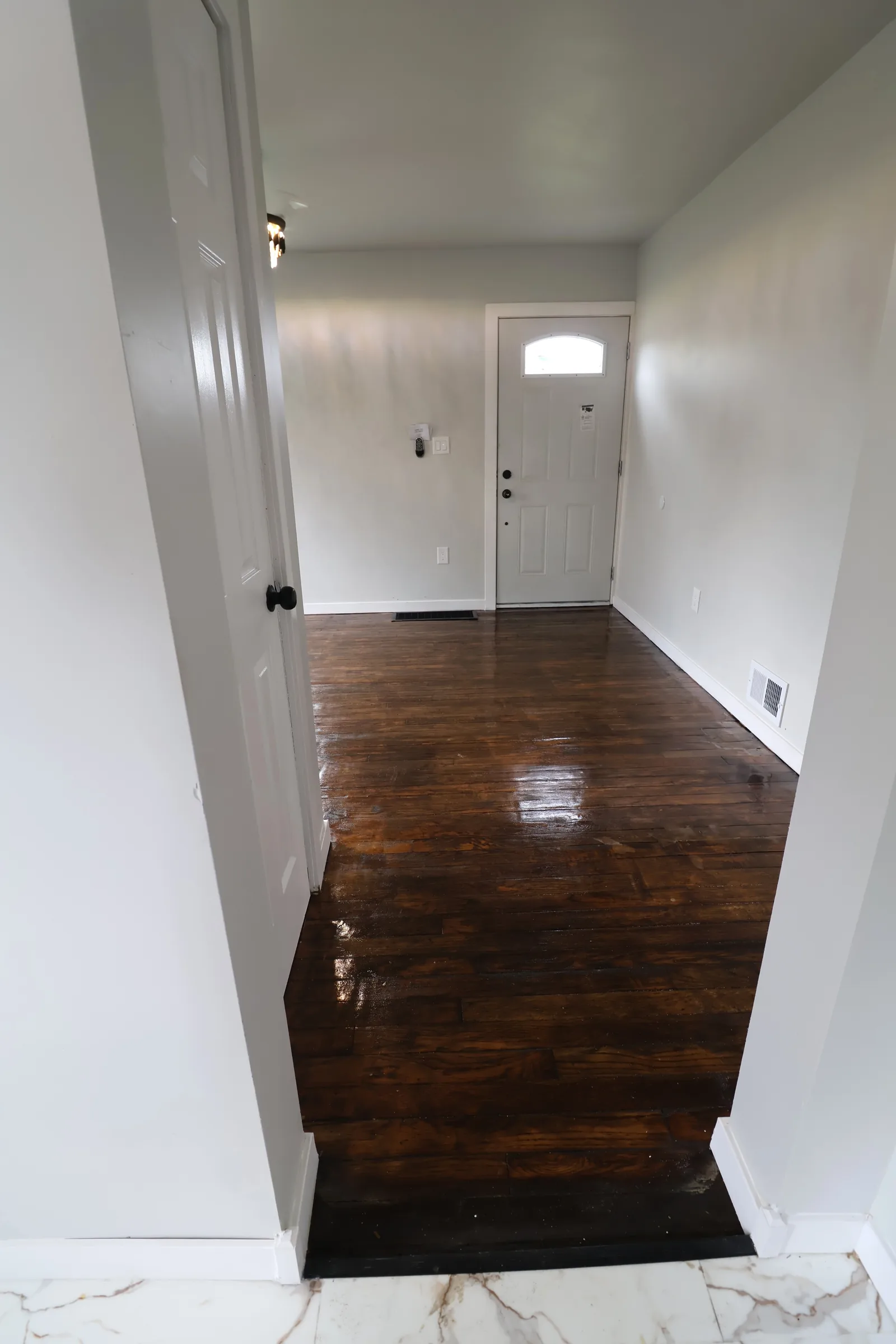Finished hallway with new trim and flooring